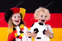 Depositphotos 115611240-stock-photo-happy-kids-german-football-supporters.jpg