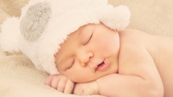 Www.GetBg.net People Children Sleeping baby in a white hat 097613 .jpg
