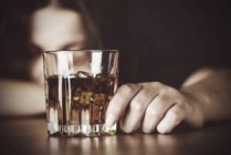 Drugabuse-shutterstock293848514-woman in front of alcohol glass-feature image-alcohol abuse-300x201.jpg
