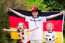 Depositphotos 114352950-stock-photo-happy-kids-german-football-supporters.jpg