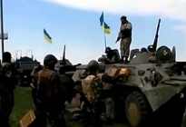 Ukrainian government troops with their hardware in Donbass.jpg
